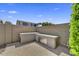 An outdoor kitchen with a built-in barbecue area, perfect for entertaining at 7407 E Portobello Ave, Mesa, AZ 85212