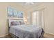 Cozy bedroom featuring neutral colors, plush bedding, and soft natural light at 7754 E Wolf Canyon St, Mesa, AZ 85207