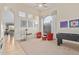 Spacious and light-filled living area with comfortable seating and an arched entry at 7754 E Wolf Canyon St, Mesa, AZ 85207