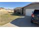 Cozy single-story home boasting a well-maintained lawn and a convenient two-car garage at 7901 W Tuckey Ln, Glendale, AZ 85303