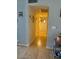A view of the hallway showcasing neutral colors and tile floors at 7901 W Tuckey Ln, Glendale, AZ 85303