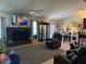 A cozy living room and kitchen combination features tile floors and comfortable seating, perfect for relaxation at 7901 W Tuckey Ln, Glendale, AZ 85303