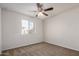 Bedroom featuring a window, and neutral paint scheme at 829 E Agua Fria Ln, Avondale, AZ 85323