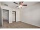 Bedroom with ceiling fan, and doorway to closet at 829 E Agua Fria Ln, Avondale, AZ 85323