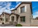 Charming two-story home features a welcoming entryway and neutral stucco, complemented by a tiled roof at 829 E Agua Fria Ln, Avondale, AZ 85323