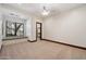 Bedroom with window seat and view to walk-in closet at 8515 E Sutton Dr, Scottsdale, AZ 85260