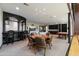 Entertaining game room with a wet bar, seating area, billiard table, and basketball court, perfect for socializing and fun at 8515 E Sutton Dr, Scottsdale, AZ 85260
