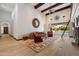 Bright living room with high ceilings, a large rug, and seamless indoor-outdoor access to the pool area at 8515 E Sutton Dr, Scottsdale, AZ 85260