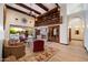 Cozy living room with fireplace, custom built-in bookshelves and media niche at 8515 E Sutton Dr, Scottsdale, AZ 85260