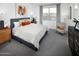 Relaxing bedroom with a comfortable bed, soft lighting, and a peaceful ambiance at 8950 W Albeniz Pl, Tolleson, AZ 85353
