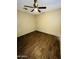Bedroom featuring wood flooring and ceiling fan at 9021 W Elm St # 7, Phoenix, AZ 85037