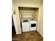 Laundry room with white washer and dryer unit at 9021 W Elm St # 7, Phoenix, AZ 85037