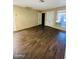 Living room showcasing wood flooring at 9021 W Elm St # 7, Phoenix, AZ 85037