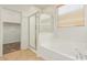 Bathroom featuring a glass enclosed shower, soaking tub, and tile flooring at 9234 W Hedge Hog Pl, Peoria, AZ 85383