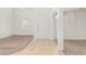 Bright and airy entryway with tile and carpet flooring and abundant natural light at 9234 W Hedge Hog Pl, Peoria, AZ 85383