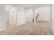 Bright and airy living room with carpet flooring and an open floor plan at 9234 W Hedge Hog Pl, Peoria, AZ 85383