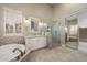 Elegant bathroom with a soaking tub, walk-in shower, and vanity with framed mirror at 14424 N 64Th Pl, Scottsdale, AZ 85254