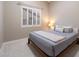 Comfortable bedroom with natural light, carpet, and neutral-toned walls at 14424 N 64Th Pl, Scottsdale, AZ 85254