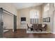 Formal dining room with vaulted ceilings, modern chandelier, and stylish accents at 14424 N 64Th Pl, Scottsdale, AZ 85254