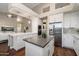Modern kitchen featuring a large island, stainless steel appliances, and plenty of cabinet storage at 14424 N 64Th Pl, Scottsdale, AZ 85254