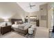 A spacious main bedroom features a king-sized bed, neutral tones, and ample natural light at 14424 N 64Th Pl, Scottsdale, AZ 85254