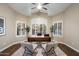 Well-lit office featuring high ceilings, dual windows, and stylish furnishings, perfect for productivity at 14424 N 64Th Pl, Scottsdale, AZ 85254