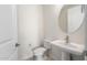 Bathroom features include a pedestal sink, faucet, and toilet, with tile floors at 21278 N 272Nd Ave, Buckeye, AZ 85396