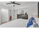 Cozy bedroom boasts neutral walls, tile flooring, and access to bathroom at 625 S Daley --, Mesa, AZ 85204