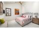 Comfortable bedroom with vaulted ceilings, natural light, and stylish decor at 10057 E Blue Sky Dr, Scottsdale, AZ 85262