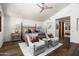 Spacious main bedroom with vaulted ceilings and seating area at 10057 E Blue Sky Dr, Scottsdale, AZ 85262