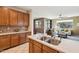 Well-equipped kitchen with stainless steel appliances and ample counter space, offering seamless entertaining options at 10224 S 175Th Ave, Goodyear, AZ 85338