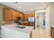 Well-appointed kitchen featuring stainless steel appliances, tile backsplash, and ample counter space at 10224 S 175Th Ave, Goodyear, AZ 85338