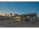 Backyard area with covered patio, ideal for enjoying the outdoors and sunsets at 10713 E Oasis Dr, Mesa, AZ 85208
