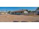 Single-story home featuring a classic facade and a spacious front yard at 10713 E Oasis Dr, Mesa, AZ 85208