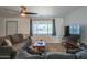 Comfortable living room with modern furniture and a bright, airy ambiance at 10713 E Oasis Dr, Mesa, AZ 85208