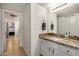Bathroom featuring a single sink, granite counters, and modern lighting at 1215 E Lemon St # 222, Tempe, AZ 85281