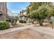 Building exterior surrounded by a well-maintained landscape with direct access via stairs at 1215 E Lemon St # 222, Tempe, AZ 85281