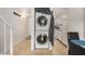 Convenient, stacked washer and dryer setup near the kitchen for easy laundry access at 1215 E Lemon St # 222, Tempe, AZ 85281