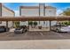 View of a covered parking structure, with multiple cars parked in the parking spots at 1215 E Lemon St # 222, Tempe, AZ 85281