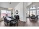 Dining area with modern chandelier, dining table, and decorative wall mirror at 1266 S Harrington St, Gilbert, AZ 85233