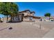 Charming two-story home featuring desert landscaping, pathway lights, and a welcoming entrance at 1266 S Harrington St, Gilbert, AZ 85233