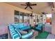 Inviting covered patio with comfortable seating and ceiling fans at 1266 S Harrington St, Gilbert, AZ 85233