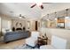Bright living space showcasing an open layout with a seamless flow to the kitchen at 12738 W Nogales Dr, Sun City West, AZ 85375
