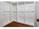 Walk-in closet with custom shelving and ample storage space at 12738 W Nogales Dr, Sun City West, AZ 85375