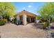 Expansive backyard with covered patio, barbecue grill, and desert landscaping for easy maintenance at 14037 E Coyote Rd, Scottsdale, AZ 85259