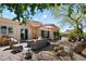 Outdoor seating area with decorative lighting, desert landscaping, and covered patio at 14037 E Coyote Rd, Scottsdale, AZ 85259