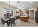 Open kitchen with stainless steel appliances, a center island, breakfast nook, and views to the backyard at 14037 E Coyote Rd, Scottsdale, AZ 85259