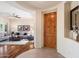 Open concept floor plan with hardwood flooring, modern furniture, and lots of natural light at 14037 E Coyote Rd, Scottsdale, AZ 85259