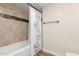 Bathroom features a shower and tub at 14815 N 21St St, Phoenix, AZ 85022