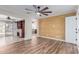 A bedroom featuring a decorative wood wall adjoins a closet area and offers neutral flooring at 14815 N 21St St, Phoenix, AZ 85022